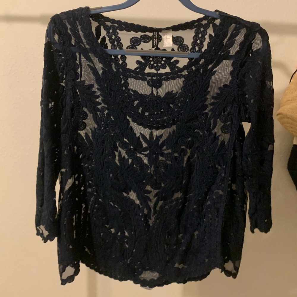 Navy blue sheer top with sewn pattern